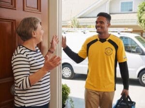 Solutions Heating & Cooling technician arriving at Lynchburg VA home for air duct cleaning