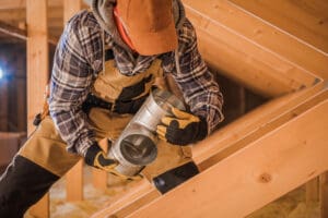 Do I need new ductwork with my furnace replacement? HVAC tech inspects metal duct fittings